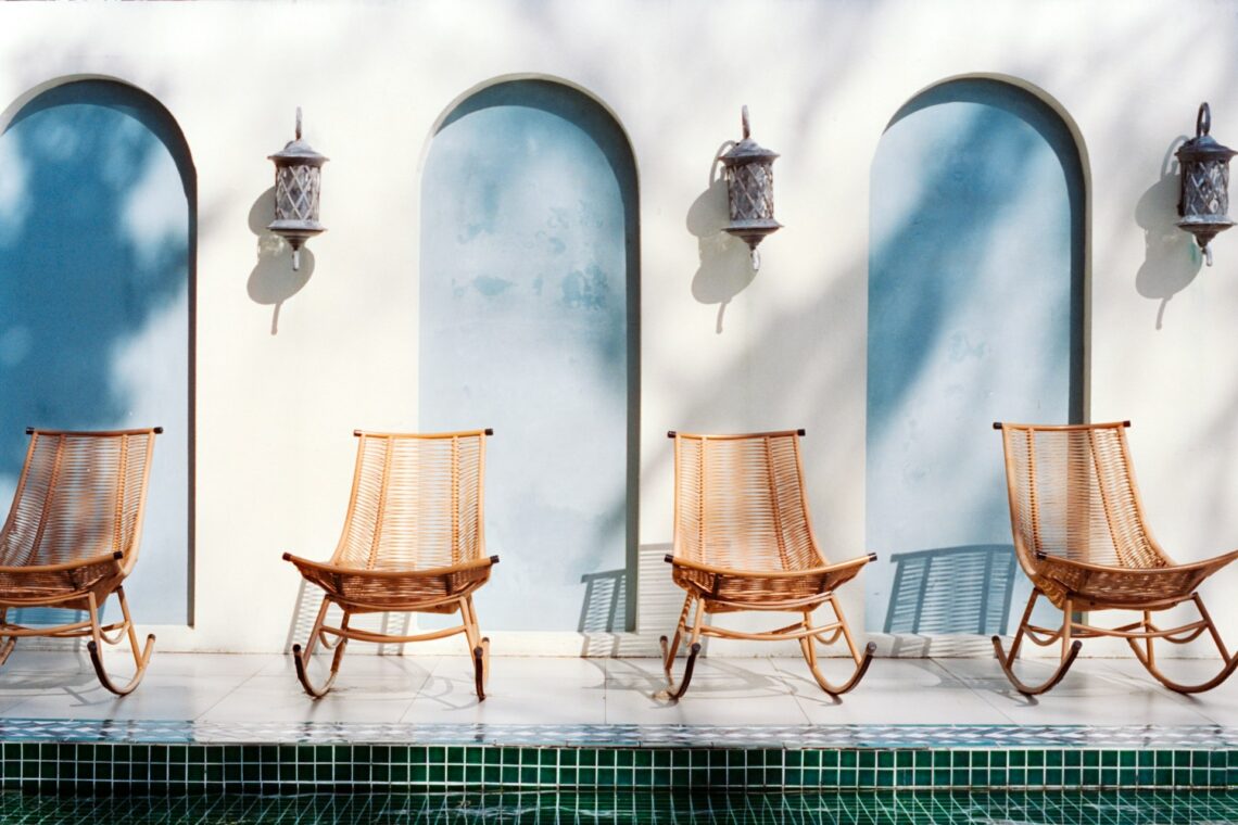 Rocking chairs by the pool